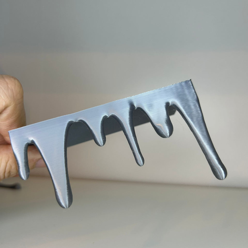 Drip bookend bottom and top decor