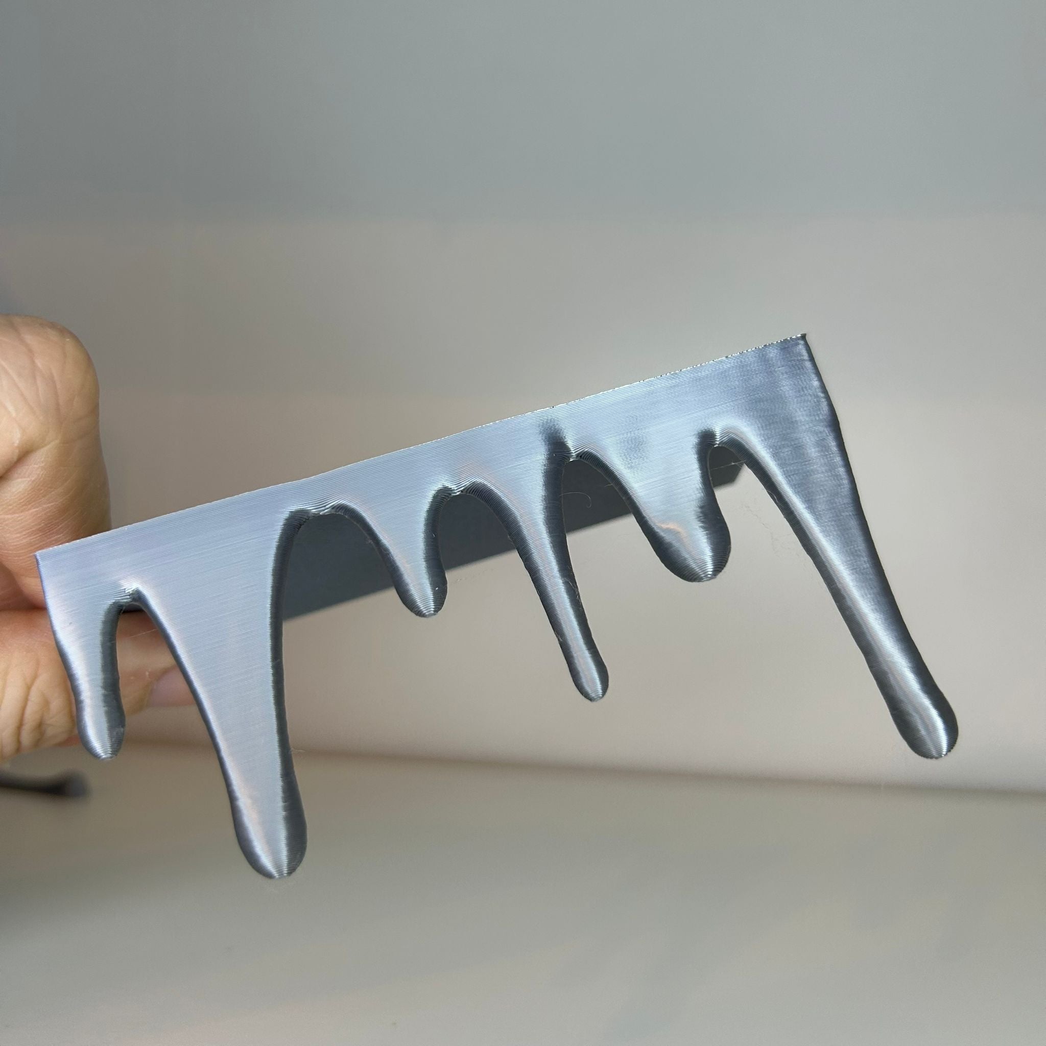 Drip bookend bottom and top decor