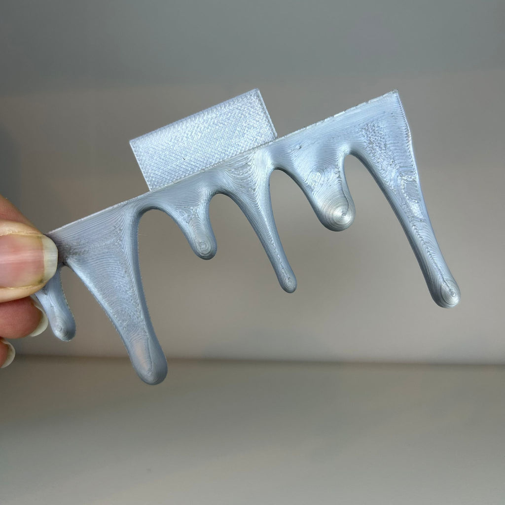 Drip bookend bottom and top decor