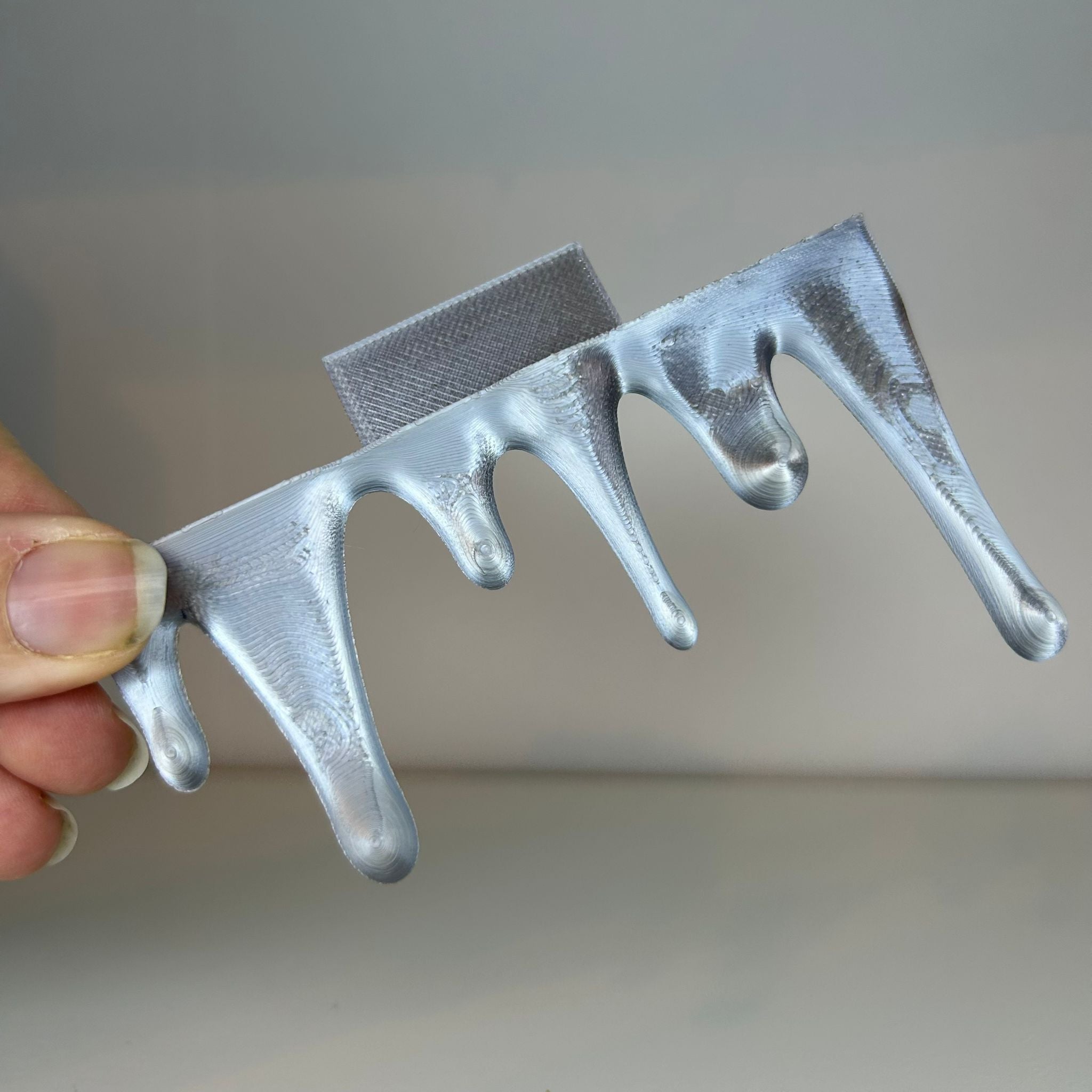 Drip bookend bottom and top decor