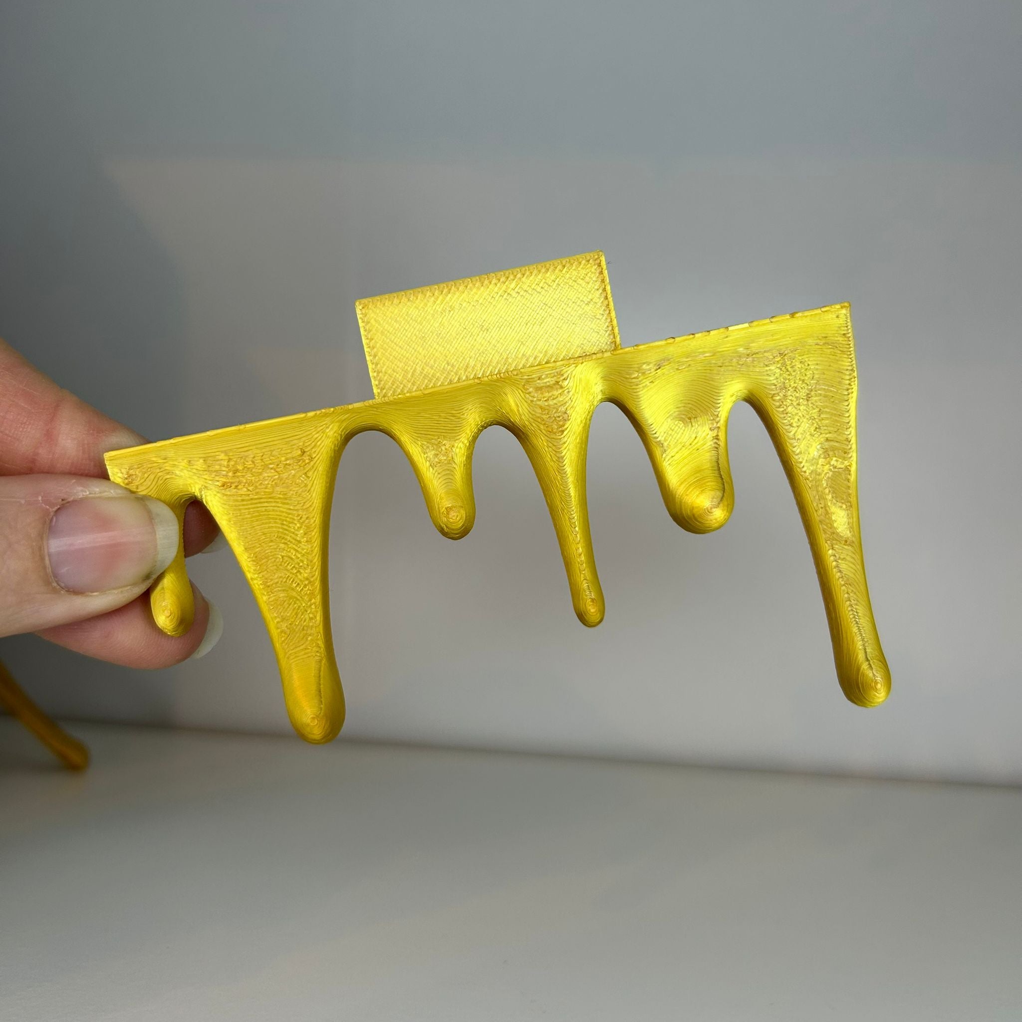 Drip bookend bottom and top decor