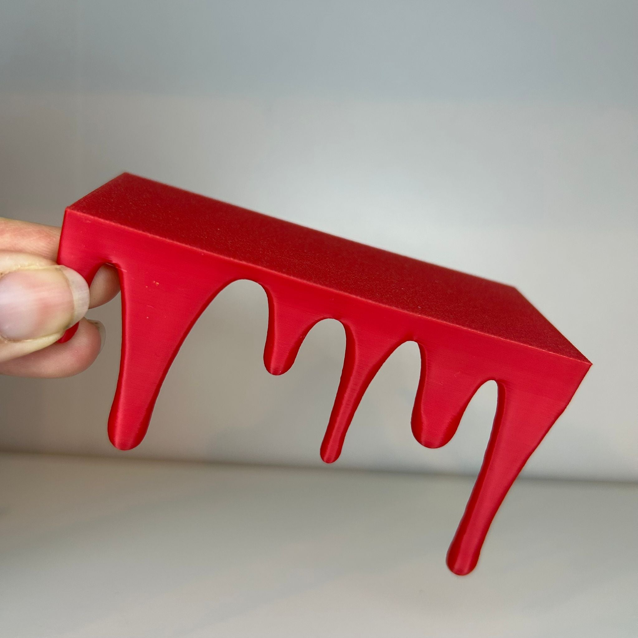 Drip bookend bottom and top decor