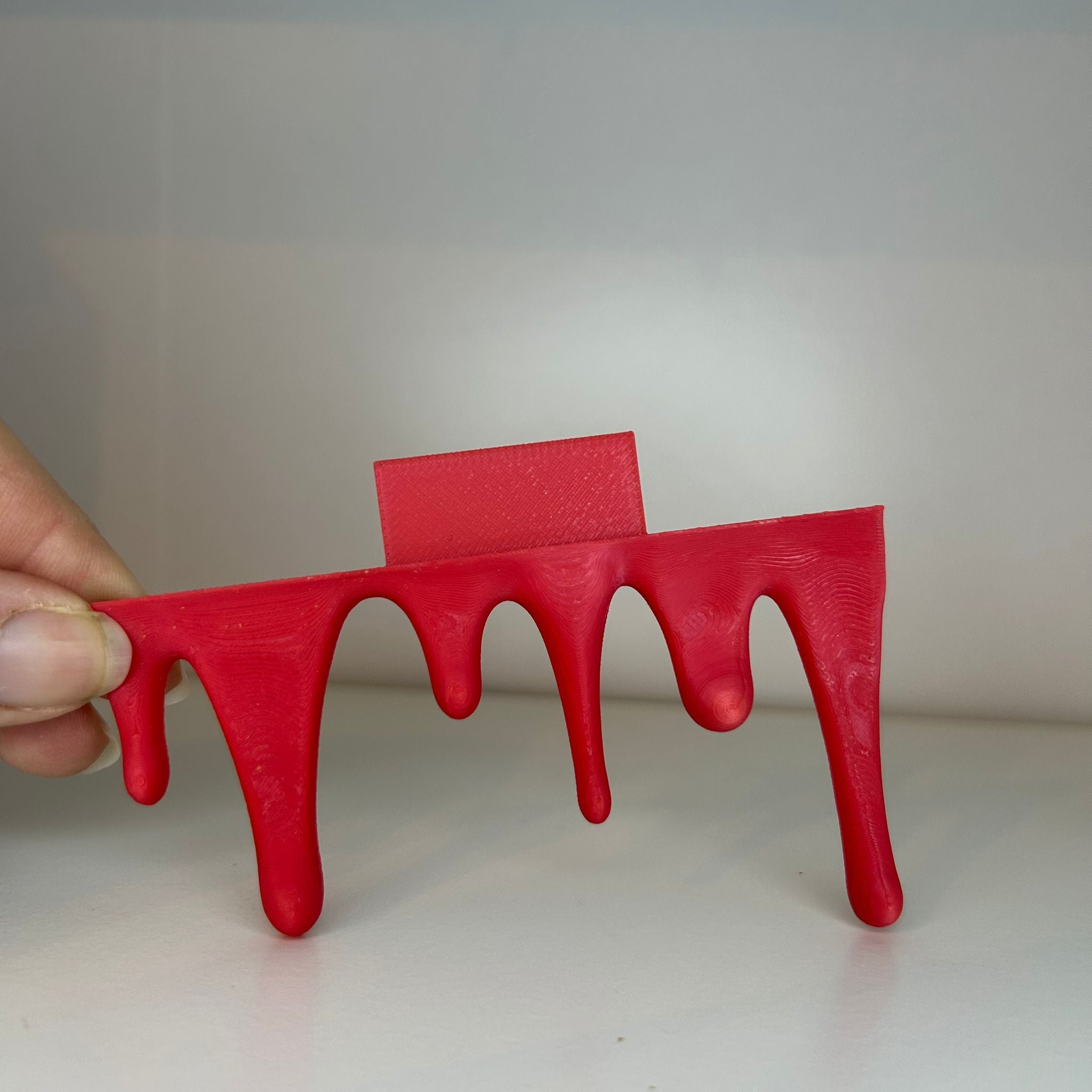 Drip bookend bottom and top decor